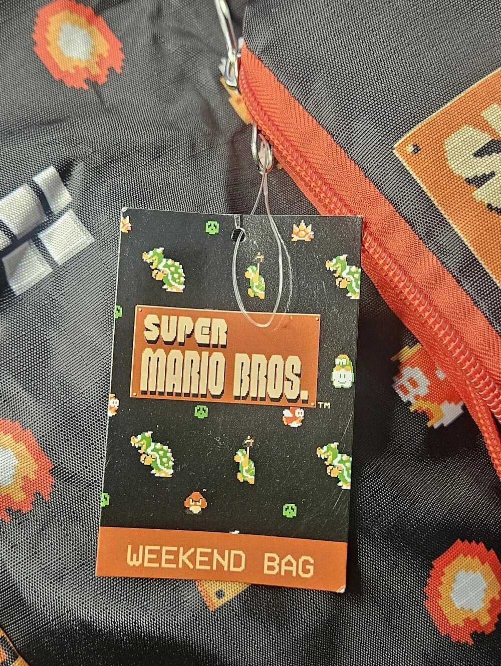 Nintendo Super Mario Bros. Black Duffel with Red Accents.  Culture Fly Bag
